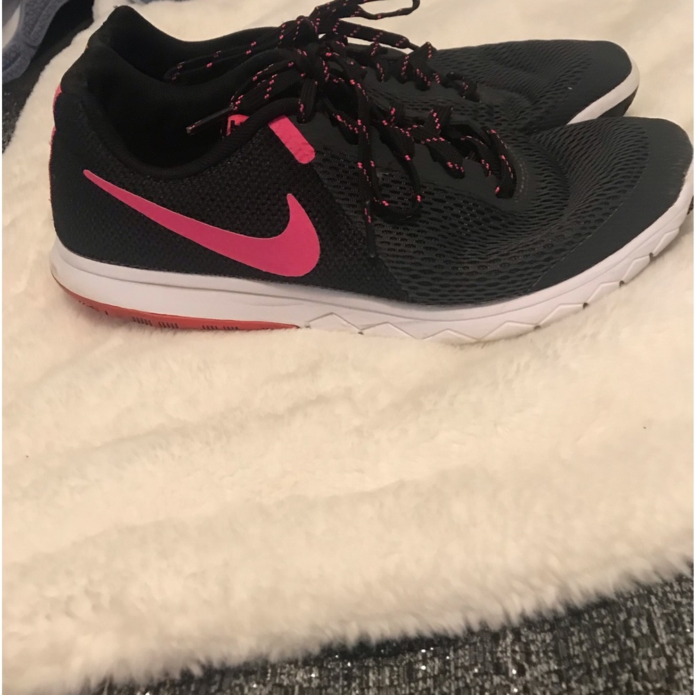 Nike running womens black and pink shoes size 10.